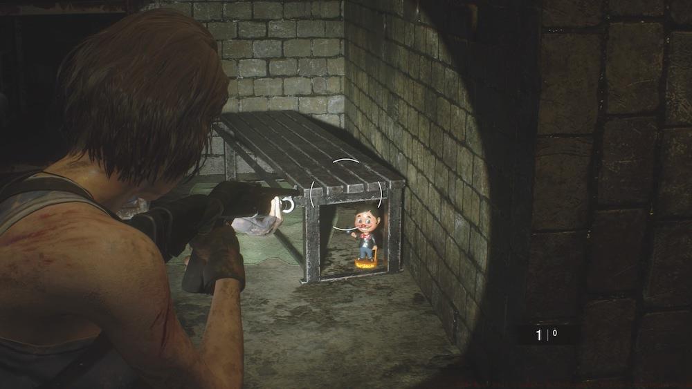 As you leave the Subway Tunnel, you'll pass some alcoves with beds and benches. This Charlie Doll is hidden in the last one on the right.